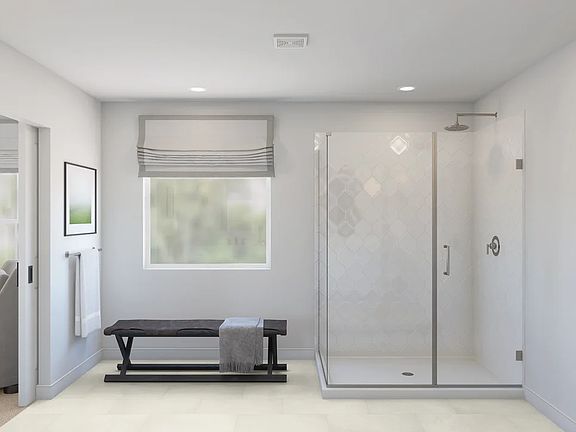 Primary bath with glass shower enclosure