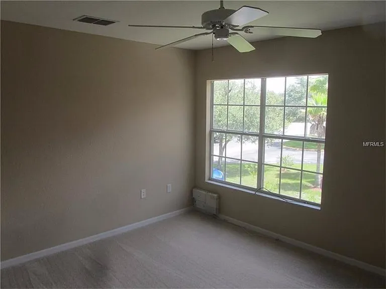 9020 Lake Chase Island Way — Photo 4