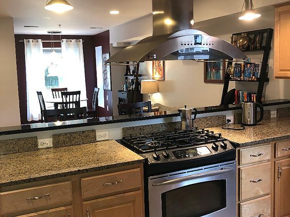 Stainless steel appliances and range hood