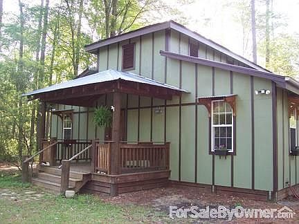 front of house w/ covered porch
						:
						watch the sunset in the evening