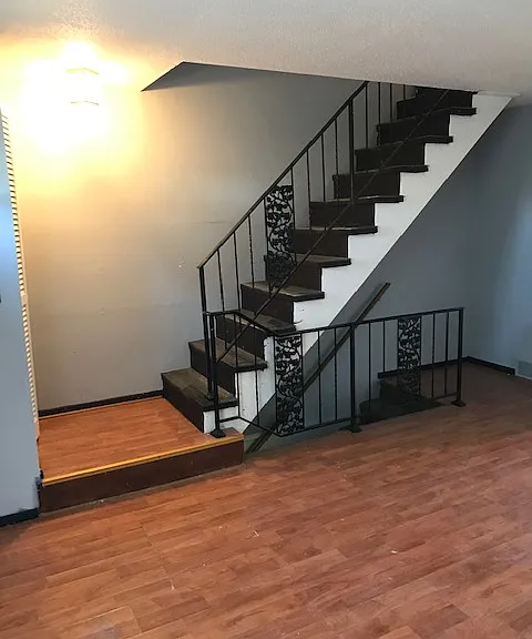 Stairway from living room to upper level