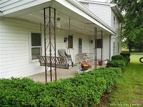 WHO DOESN'T WANT A FRONT PORCH WITH A SWING?
