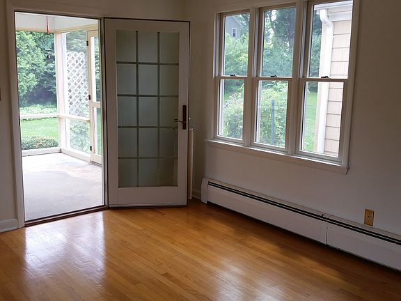 Room off of kitchen leading to porch