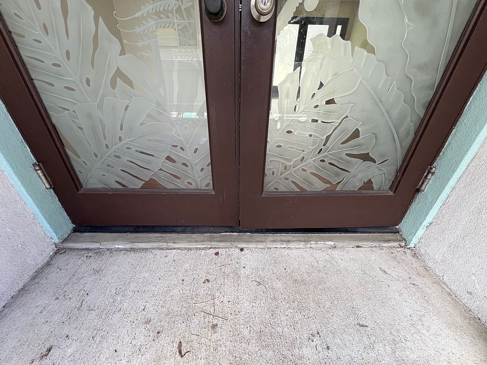 custom glass detail on the right entry doors.
