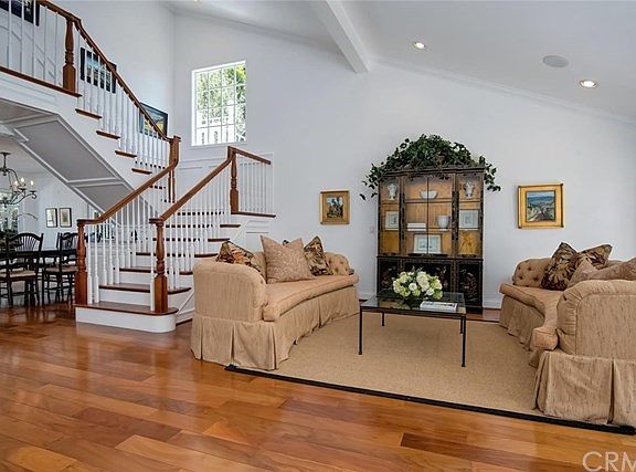 Living Room, Dining Room, and Custom Staircase