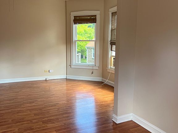 Entryway with room for a desk, table or bench with view to the family room.