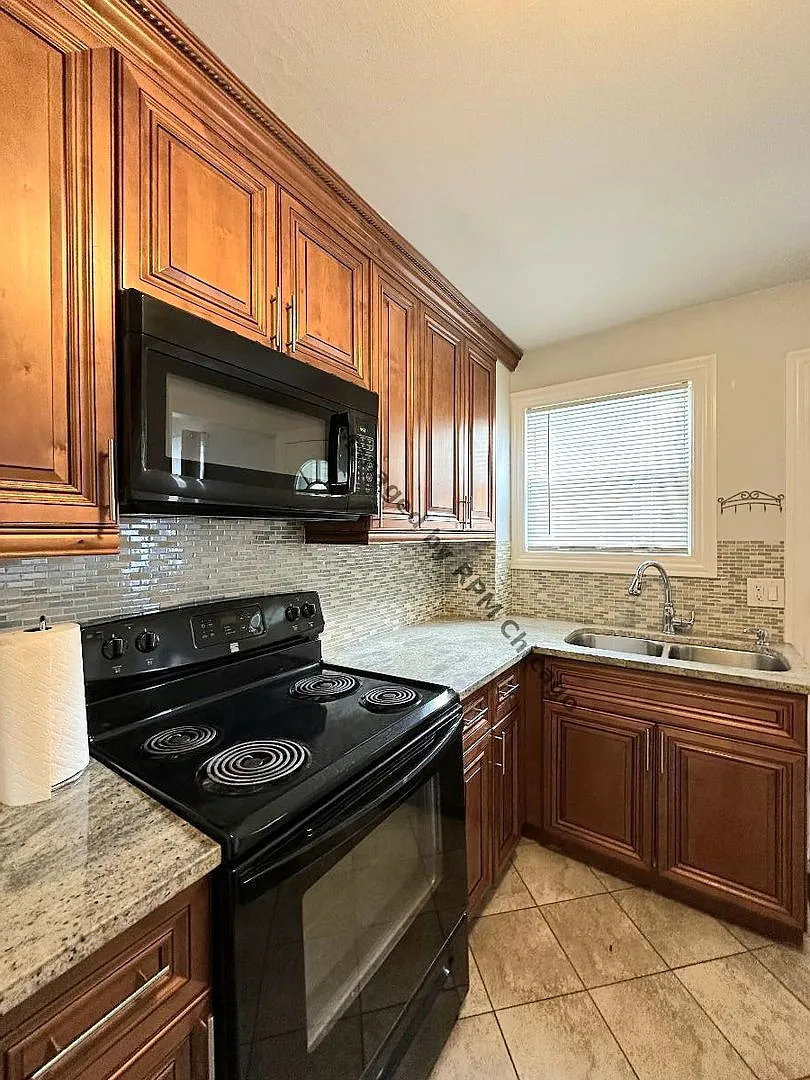 Building Photo - 1420 N Harlem Ave #E