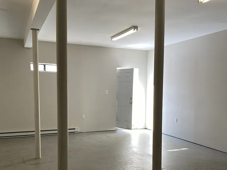 Dedicated to 2nd Floor Storage Room with Rear Yard Access