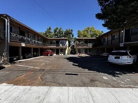 The front parking lot area of 10778-10786 Pippin St