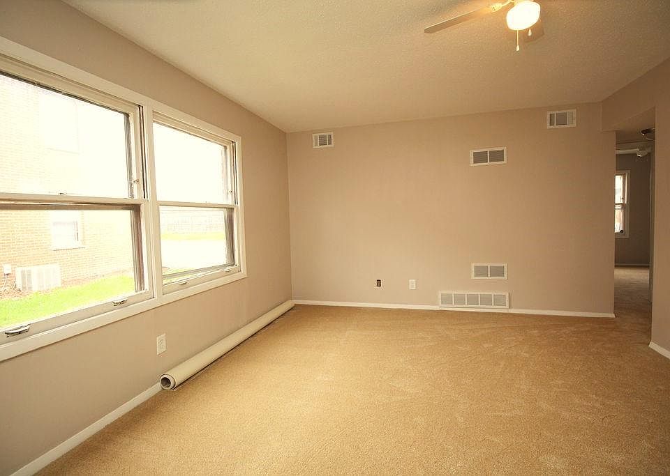 Spacious, bright living room with lovely new floors and heaps of streaming natural light!