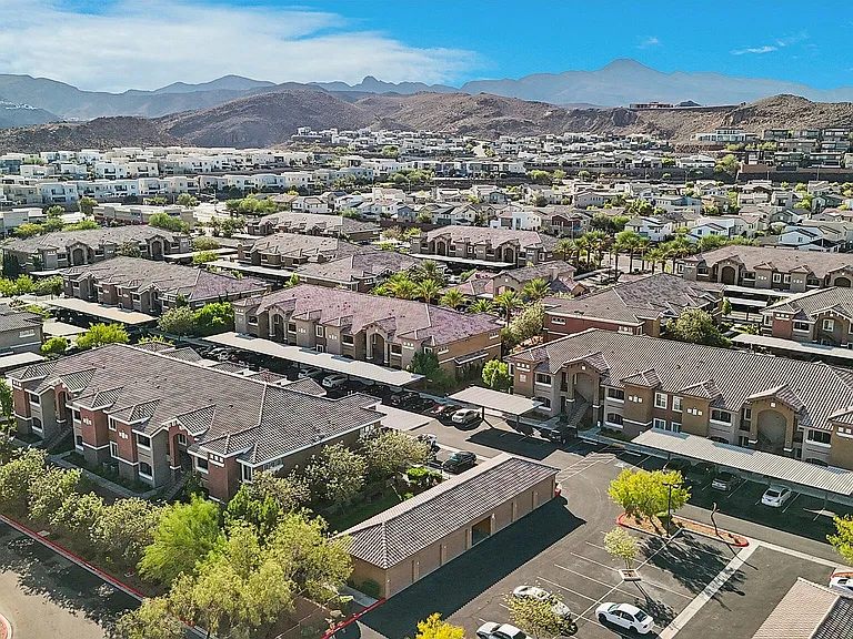 Aerial of McDonald Ranch Set Against Mountains
