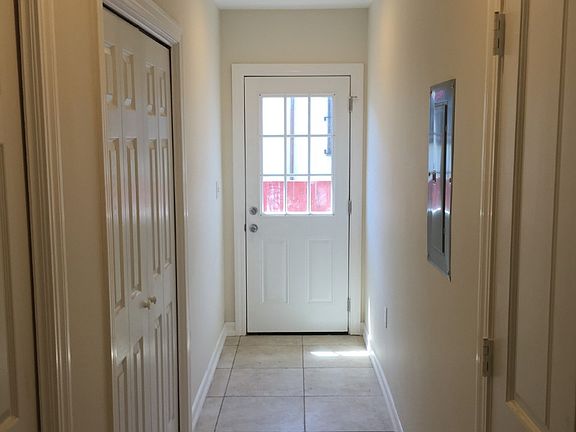 Hallway to side door 