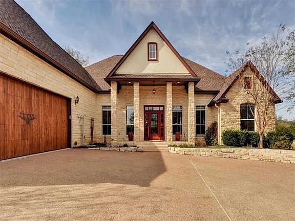 Welcoming front porch with beautiful glass front door