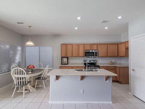 4th image of 9851 E Flower Ave