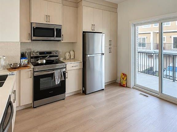 4th image of 75 W Cornerstone Row NE #106