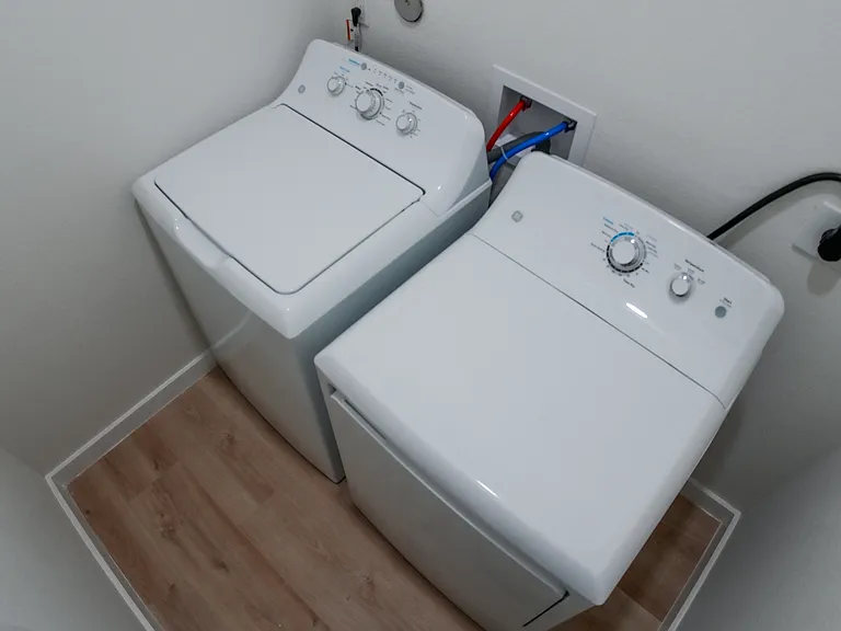 Full size Washer/Dryer in unit.