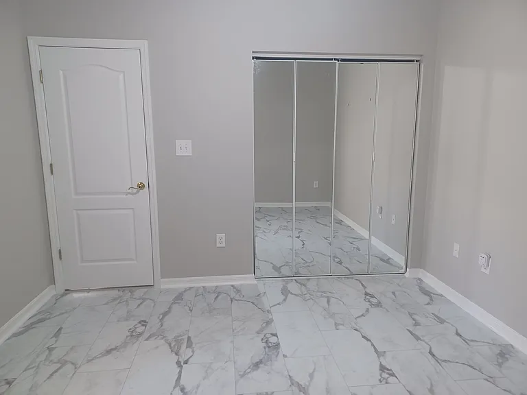 Guest Bedroom
Mirrored Closet