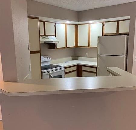 2nd image of 3360 Pinewalk Dr N APT 1312