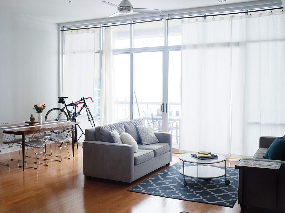 Living space with a large balcony attached.