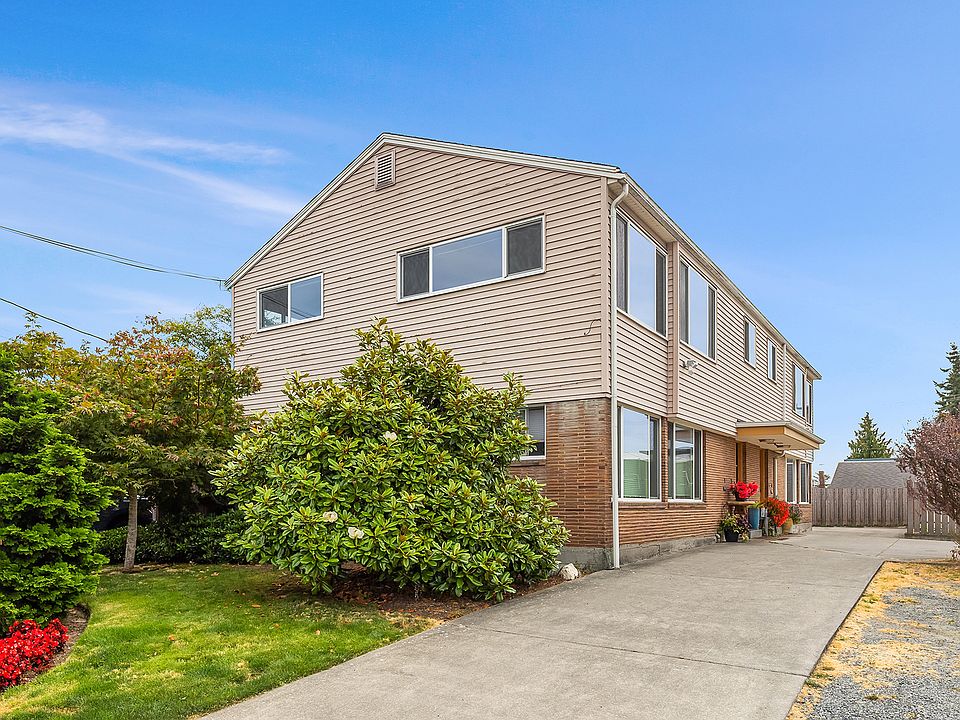 Darling 4-Plex in prime location. Well maintained with Mid-Century character and designer updates. Steps to PCC, Green Lake, short walk to both Phinney Ridge and Green Lake & an easy commute to downtown. Welcome home!
