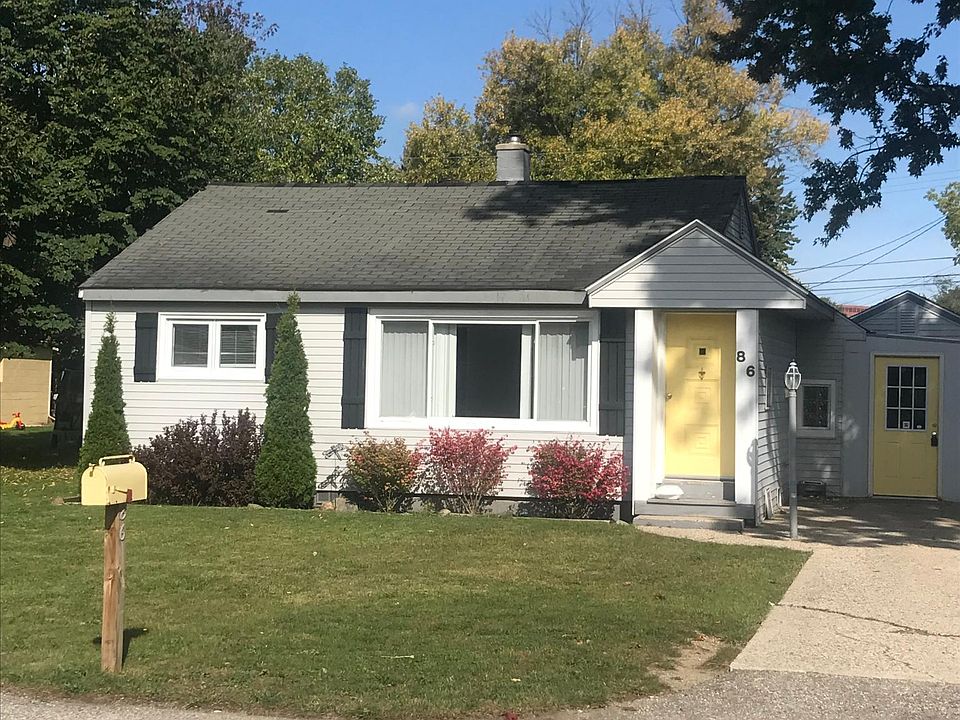 Look for the yellow mail box and doors.