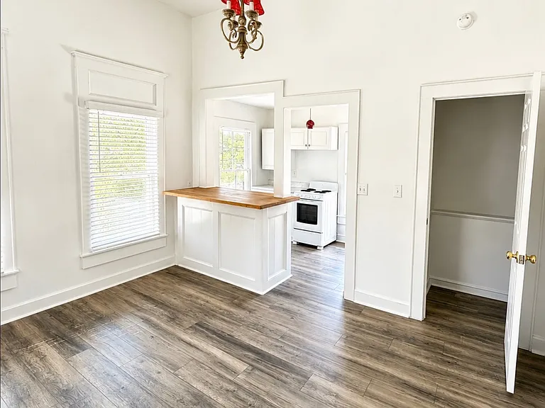 Living Room & Kitchen - with view of kitchen island and stove