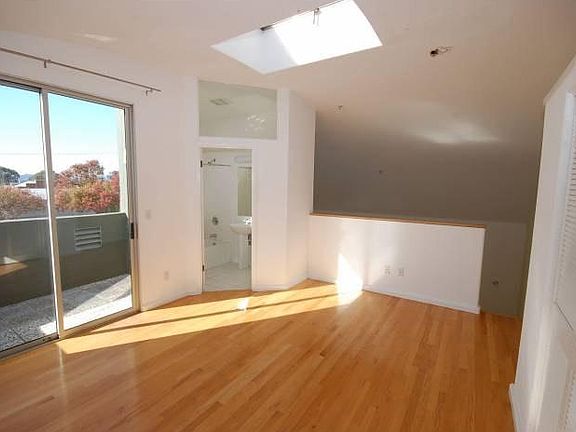 Bedroom with 3rd floor balcony and 2nd bath