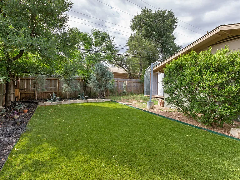yard, opposite view. Work shop at back/right corner.