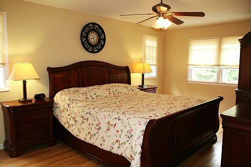Master bedroom with walk in closet and private bathroom