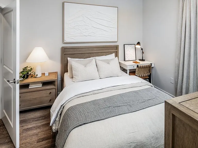 Showroom bedroom with hard surface flooring