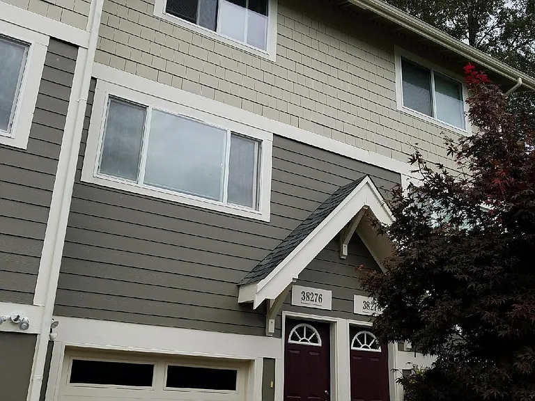 Front of building with garage entrance.