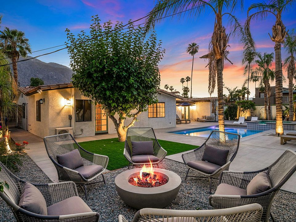 Enjoy the backyard oasis and fire pit