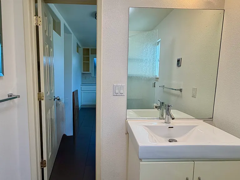 Bathroom facing kitchen.