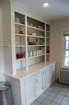 built in btw kitchen & entry