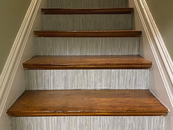 Staircase Entry - refinished hardwood and decorative risers