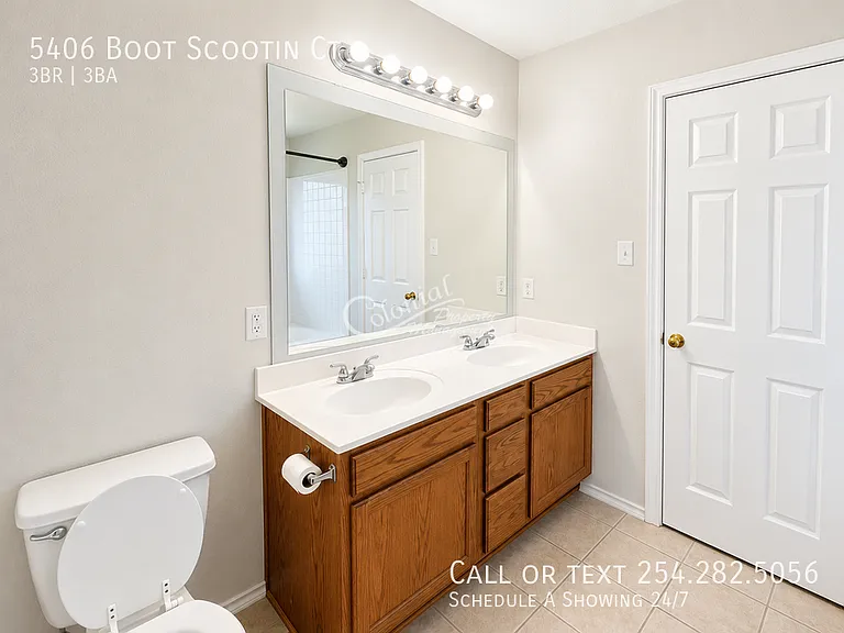 5406 Boot Scootin Ct — Photo 25