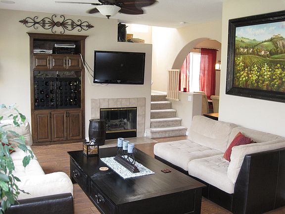 Media area, wine rack and fireplace