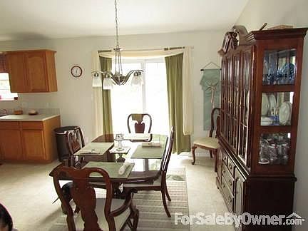 Dining Room
						:
						Can be formal or informal. Sliding door to large deck.