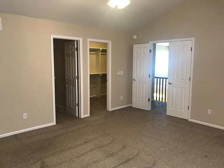Primary bedroom with two large closets.