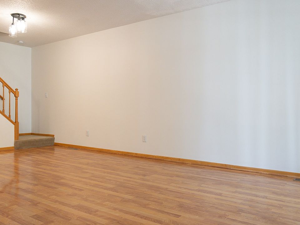 Spacious open floor plan with family and kitchen. Main floor half bath.