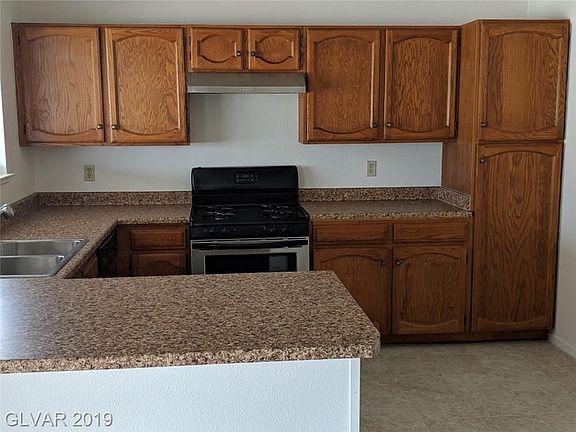 New countertops, new appliances, new floor in kitchen.