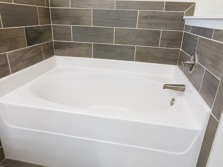 Master has deep tub for soaking
