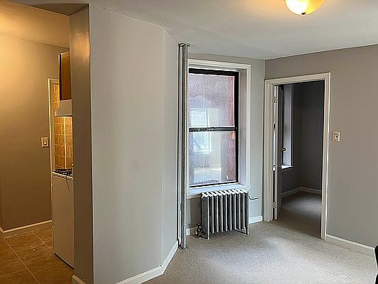 1st image of 411 E 118th St APT 14