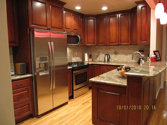 Kitchen with wood cabinets and granite countertops