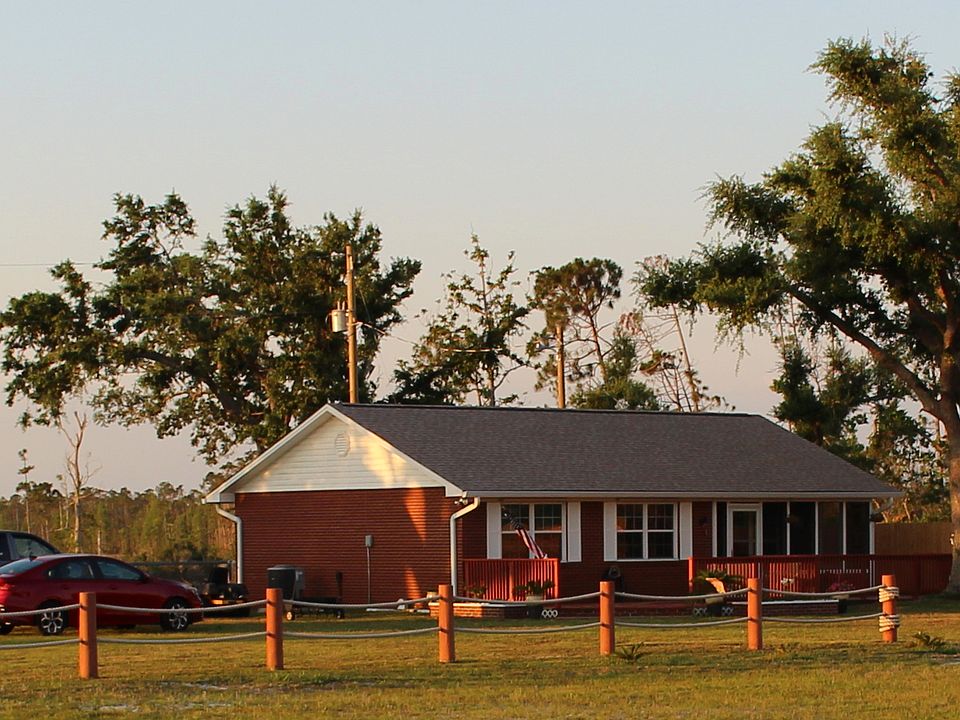 Front view of home and deck