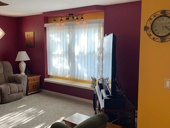 Large window seat and 65" TV