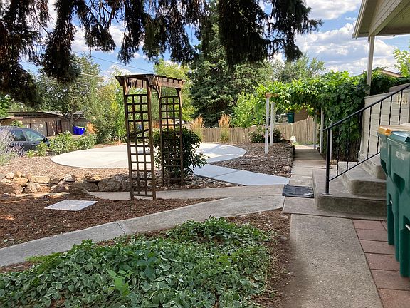In addition to the large, cozy, old-fashioned front porch, there is also a large patio area perfect for getting together with friends around a firepit.
