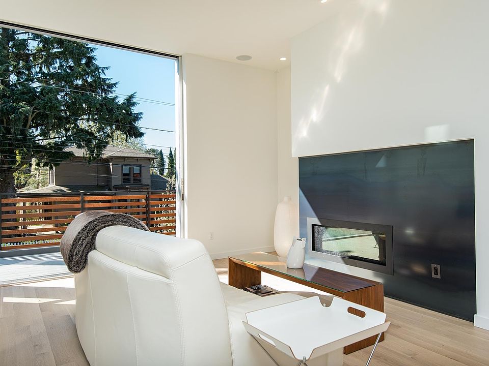 Gas fireplace, floor to ceiling "pocket" door out to front p