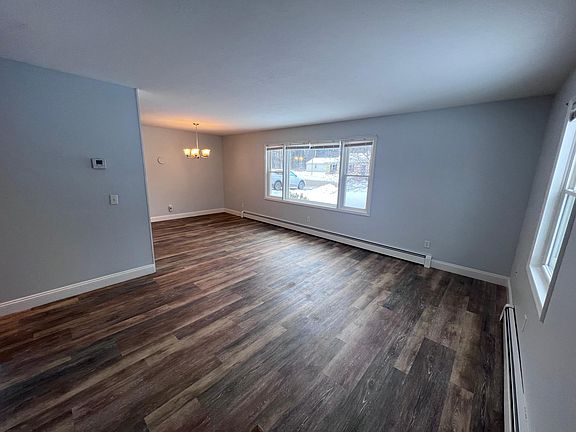 Open concept kitchen, dining and living area.