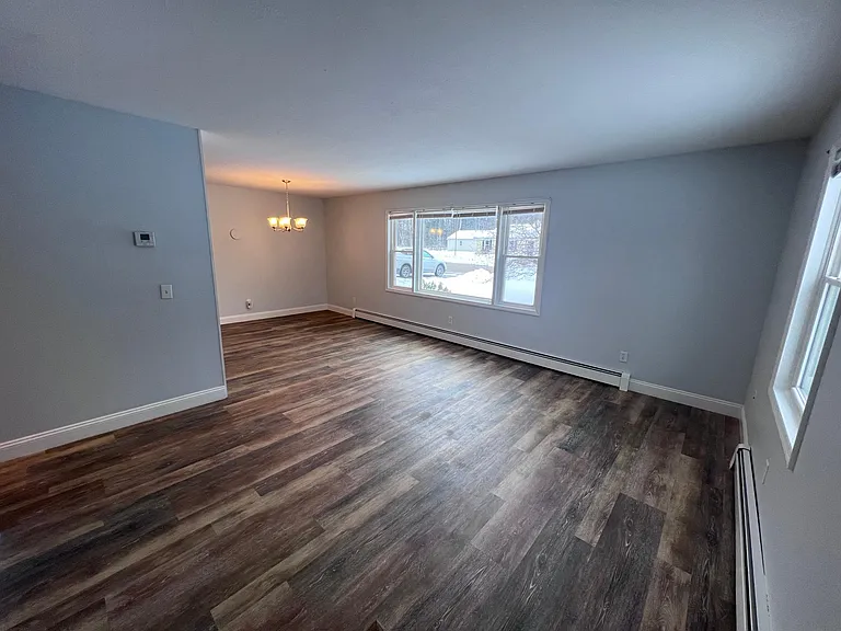 Open concept kitchen, dining and living area.